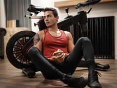 Sporty lads work the bike and each other's ass in a flaming duo