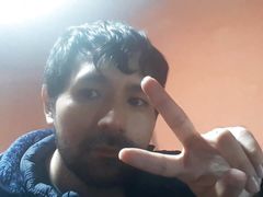 Latino Man Plays with the Camera and Masturbates