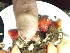 cock with cake and strawberries