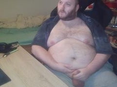 Chubby middle-aged gay guy Korus enjoying himself in a bear-themed session