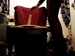 Crossdresser in pantyhose skirt and heels fucking his dildo