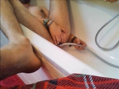 Bi-guy using shower head, squirting water, enema 2