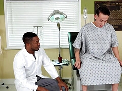 Submissive patient is examined by the black doctor
