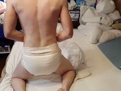Diaper boy pees thick diaper