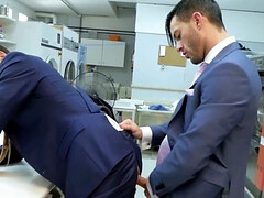 Andy Star and Dario Beck having sex in the laundromat