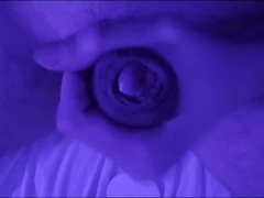 Onanism with fake penis in the backside