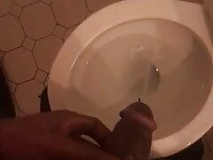 Black cock taking a piss
