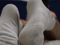 white sweaty socks play after the gym