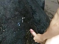 Cum shooting on the beach