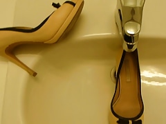 Piss in co-workers high heel (peep toe)