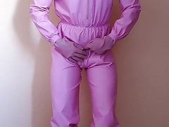 Gummiboy wanks his small penis in pink rubber and latex