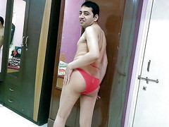 Sexy sissy crossdresser femboy sweet lollipop in a beach cover-up with a sexy pantie inside and flip-flop.