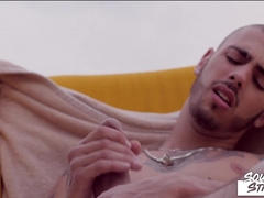 Strung up Tattooed Stud Jacks Off Before Spunking