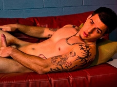 Trevor Wright orgasming with his cock in his hands