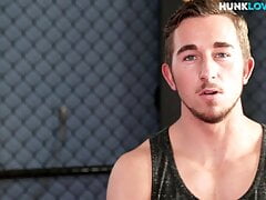 Tattooed stud having masturbation in the gym