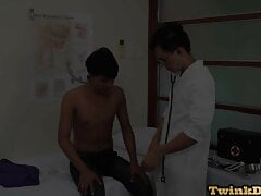Asian doctor inspecting twinks butt