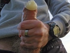 Dominate man makes his made-up buddy throat and fill condom with cum