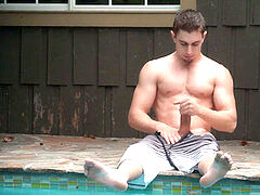 Jake wanks by the pool