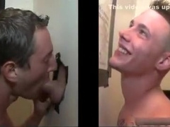 Horny dude gets his boner sucked through hole in the wall