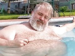 hairy chubster in the swimming pool
