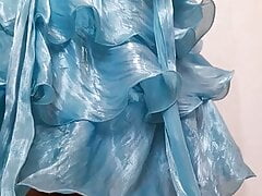 Crossdresser wearing cute satin ruffle party dress