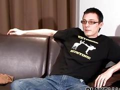 Young gay man strokes his enormous cock and shoots his load