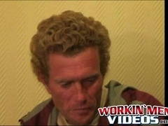 Mature dude strokes his massive cock while smoking a cigar