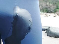 Wetting blue leggings outdoors