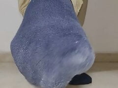 Dark blue socks on latino feet